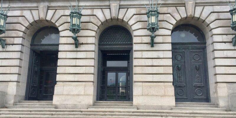 Courthouse entrance representing the Malone Lam guilty plea to RICO conspiracy